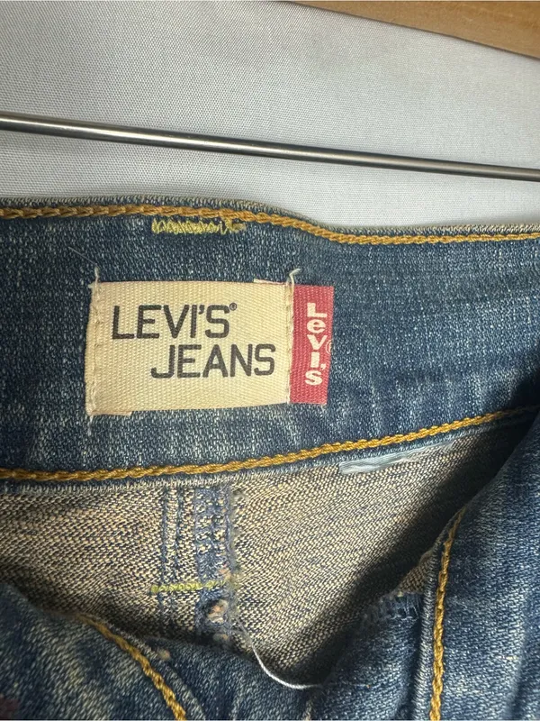 Levi's Classic Distressed Blue Denim Skirt with Raw Frayed Hem - Image 3