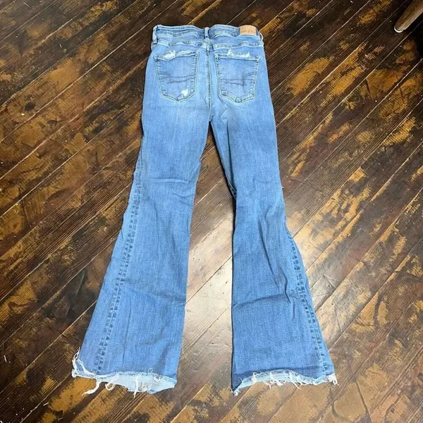 American Eagle medium wash size 2 distressed Flare jeans - Image 3
