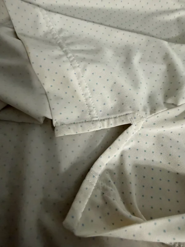 FootJoy Men’s White Polo with Light Blue Dots & Crest - Image 2