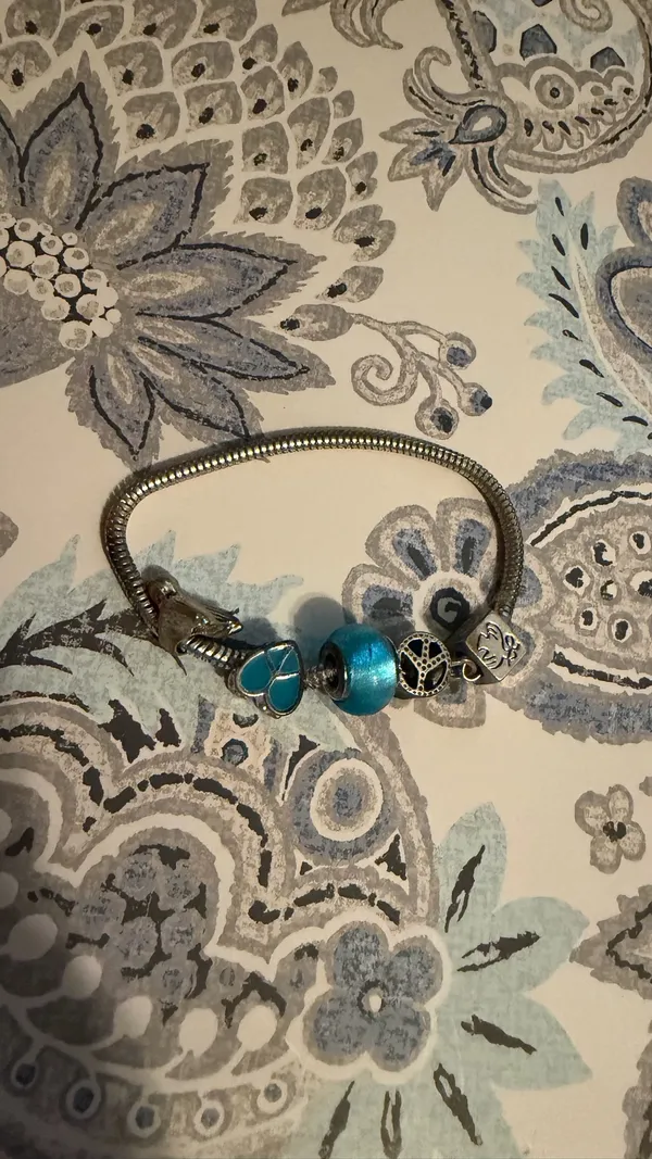 Turquoise Silver Charm Bracelet with Blue Beads birds and peace theme - Image 3