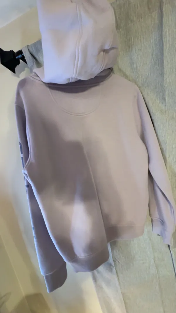 Thick, comfy Carhartt hoodie in a soft lavender/pastel purple color. Super warm heavyweight material with a relaxed, slightly oversized fit. Has a front kangaroo pocket. - Image 2