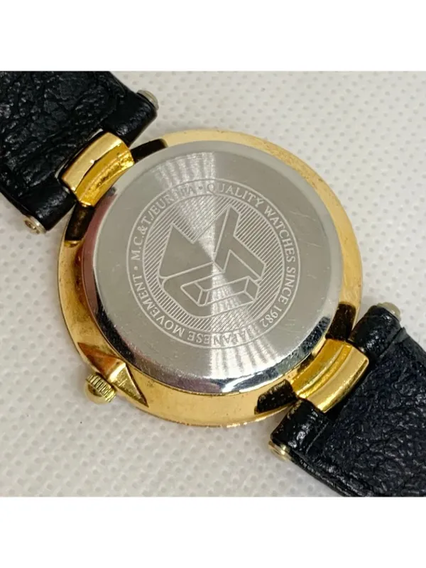 Vintage Fred Meyer women’s gold tone wristwatch black dial 32mm Quartz running - Image 4