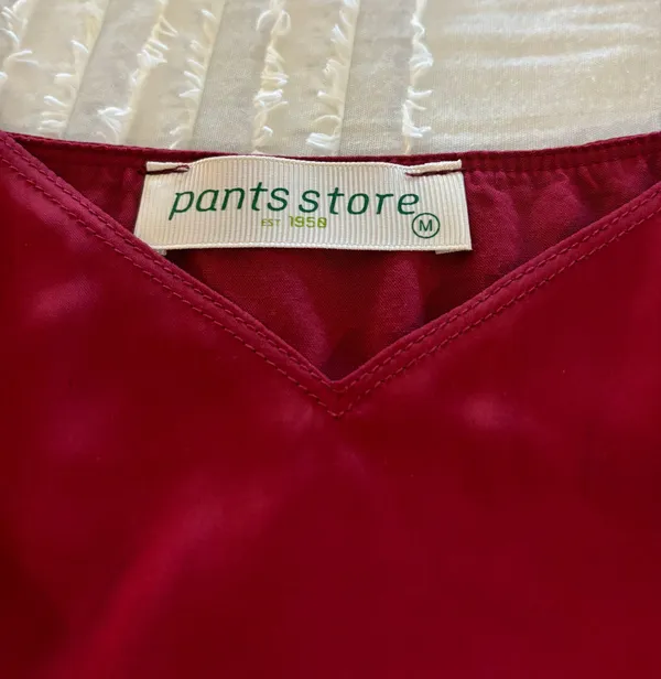 Red Shirt From Pants Store  - Image 2