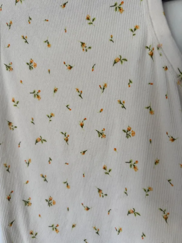SKIMS Sleeveless White Dress with Gold Dot Pattern - Image 6