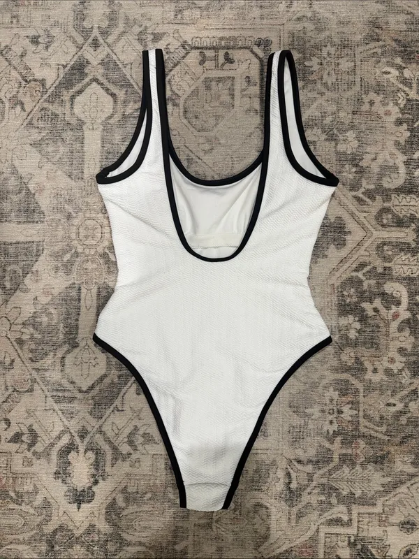 No Boundaries White One-Piece Swimsuit with Black Trim - Image 3