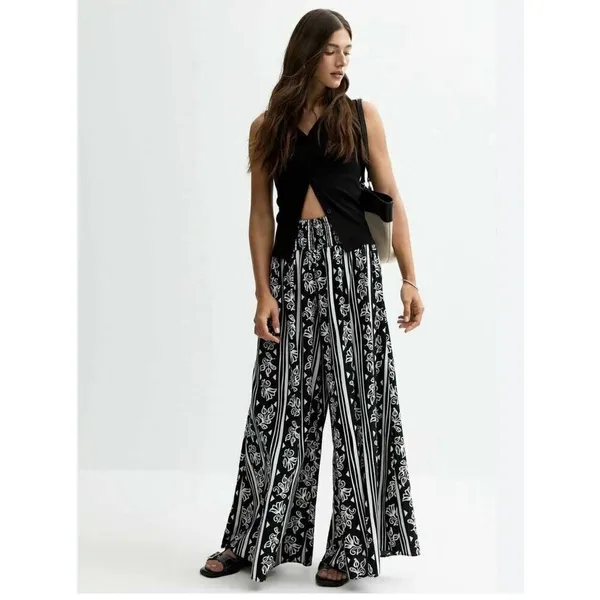 New Look FLORAL PRINT - Trousers - Wide Leg High Rise 2 Pockets Women’s L - Image 2