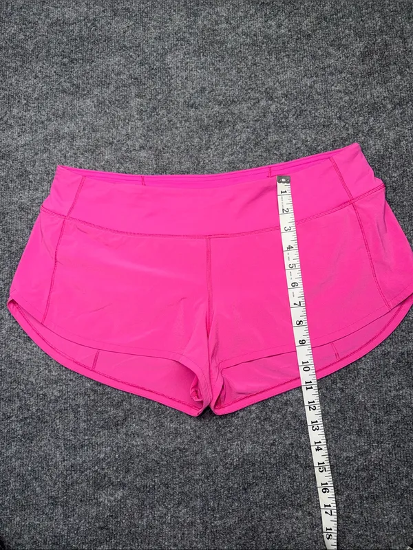 Lululemon Speed Up Shorts in the bright Sonic Pink colorway - Image 5