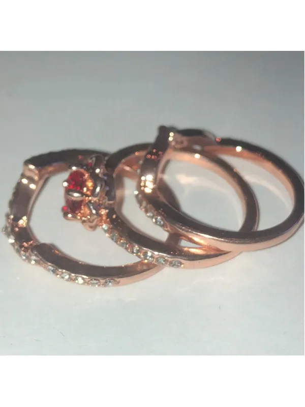 Elegant Rose Gold Tone Red Gemstone Ring Stack with Crystal Accents - Image 5