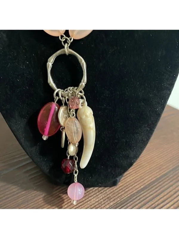 Pink beaded charm necklace with stone horn of wealth and silver tone accents - Image 2