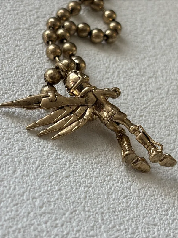 NWOT Marc Jacobs Gunmetal Angel Pendant Necklace in gold - Image 6