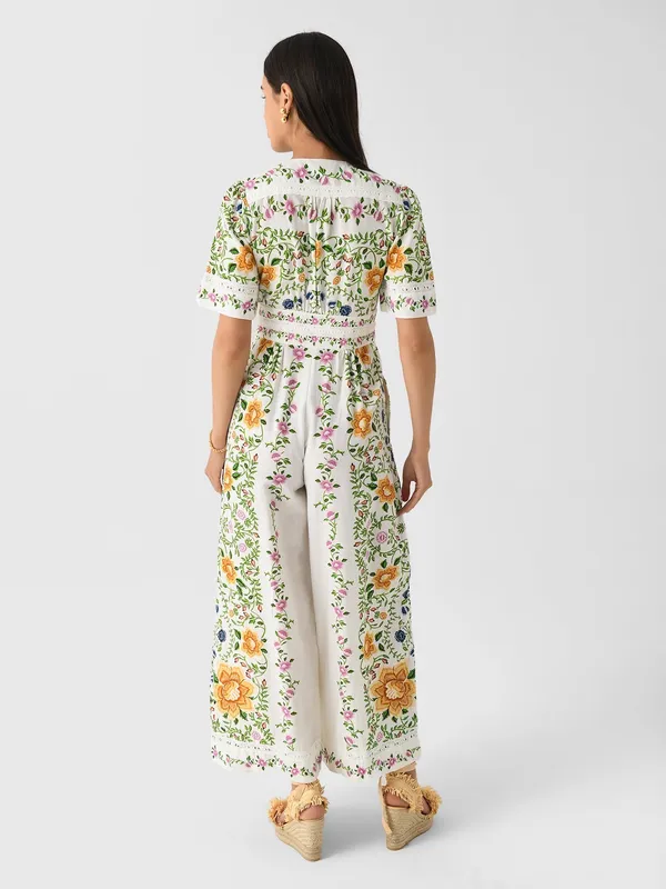 The Farm Rio Folk Floral Jumpsuit features a vibrant print with short sleeves, a V-neckline, and a relaxed, wide-leg silhouette. - Image 7