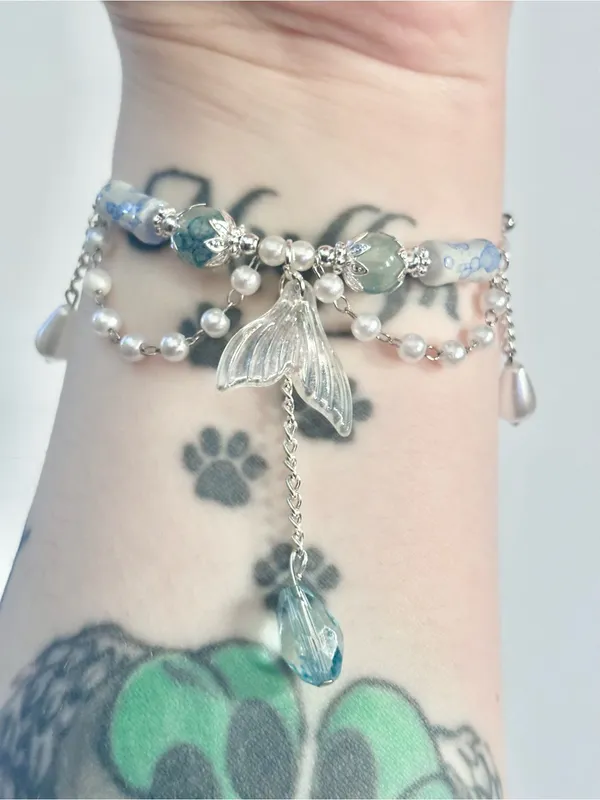 Handmade Hand Crafted Silver Bracelet with Blue and White Beads and Mermaid Tail Charm - Image 6