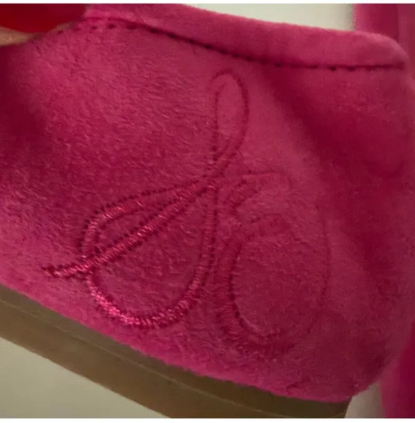 Vibrant pink suede, leather ballet flats by Sam Edelman. Featuring a rounded toe with silver logo charm detail. Perfect for adding flair to any outfit. - Image 5