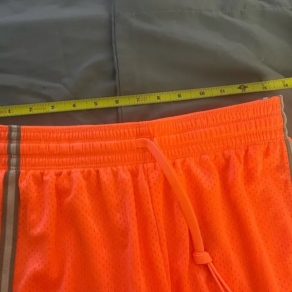 Nike Vibrant Orange Mesh Shorts with Silver Stripes - Image 2
