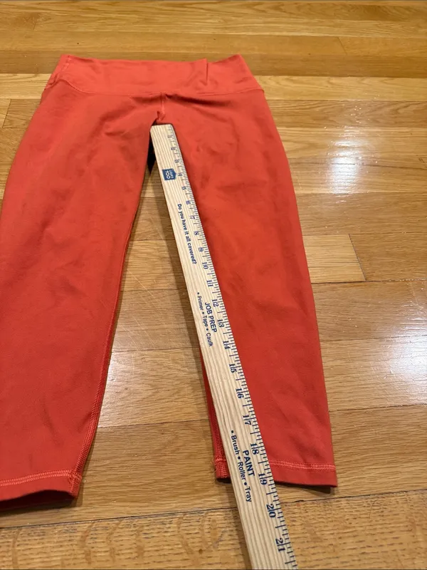 Fleo orange leggings size large . - Image 4