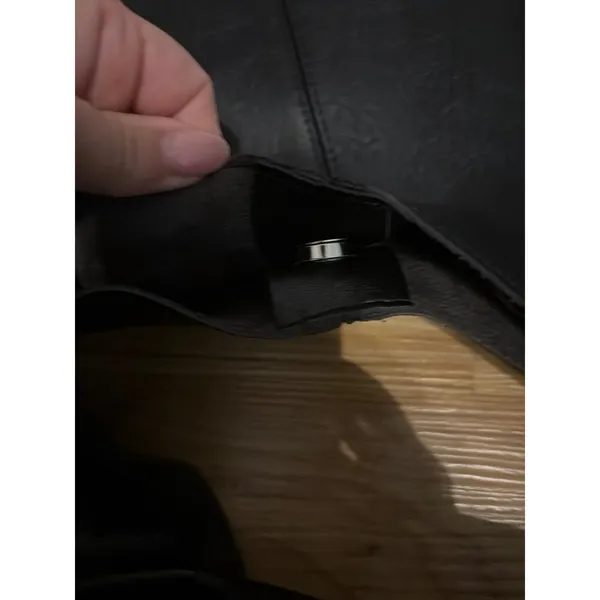 Black slouchy vegan leather shoulder bag with an unstructured, triangular hobo d - Image 6