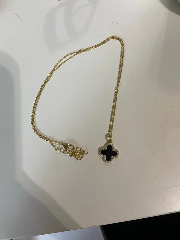 Black and gold clover necklace, bracelet and earrings set - Image 4