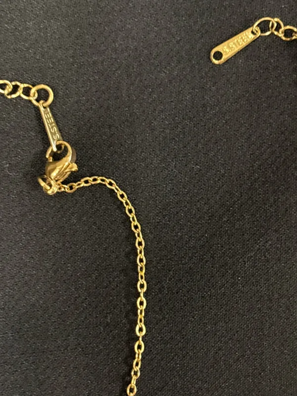 Gold clover bracelet and necklace - Image 4