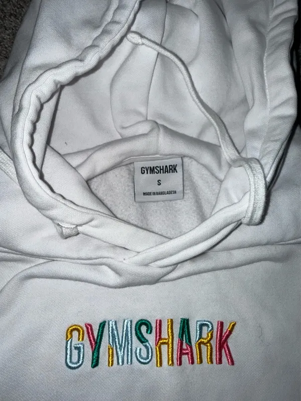 Gymshark Embroidered Logo Pullover Hoodie in White with Multicolored Text - Image 5