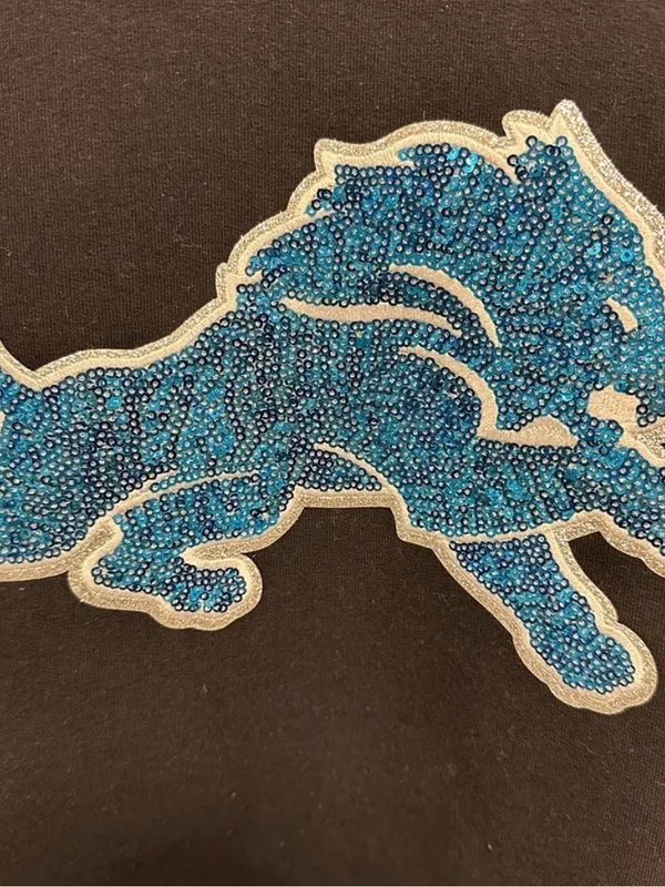 NFL Black Crewneck Sweatshirt with Blue Lion Patch - Image 2