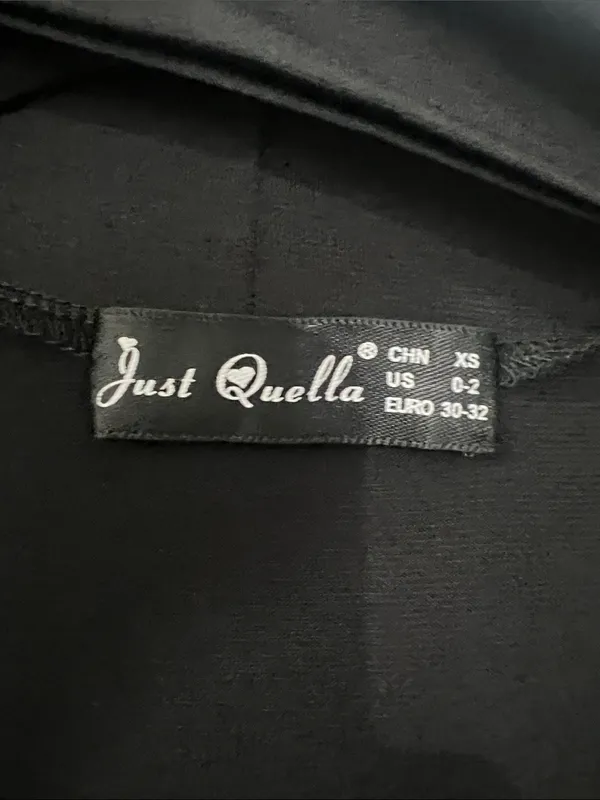 Just Quella Sleeveless Black Draped V-Neck Dress - Image 6