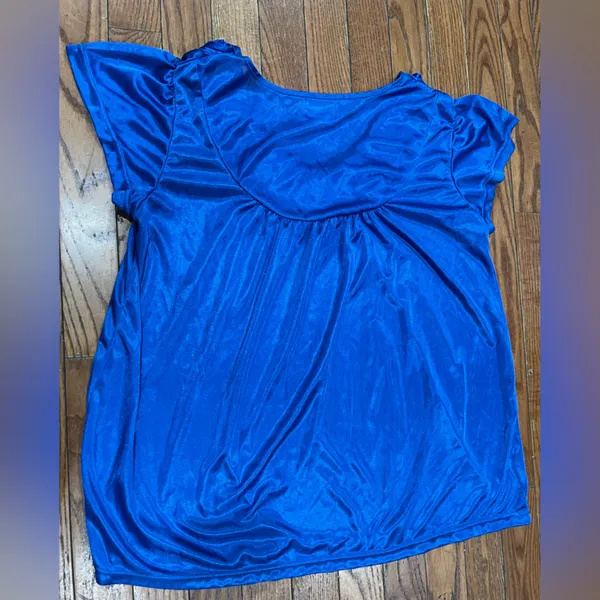 Lati Fashion…Vibrant Blue Women's Blouse with Floral Detail - Image 6