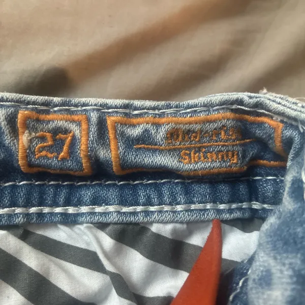 Rockin rival, distressed, and embroidered jeans - Image 5