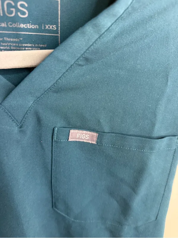 Figs Women’s Teal V-Neck Scrub Top with Navy Pants - Image 3