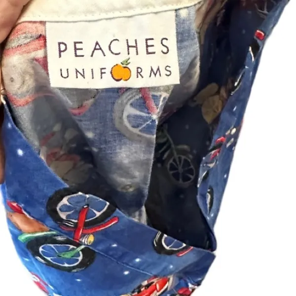 Peaches Uniforms Christmas Santa Motorcycle Scrub Shirt‎ - Image 6