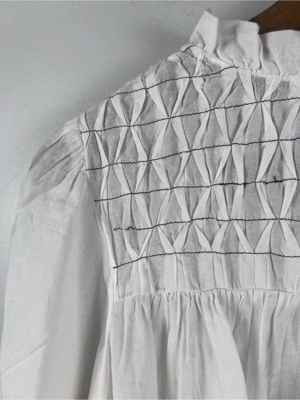 By Anthropologie Long-Sleeve Airy Babydoll Blouse white black size large - Image 9