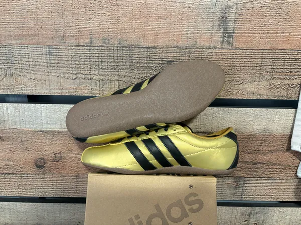 Gold adidas unisex sneakers. Metallic gold with black stripes - Image 2
