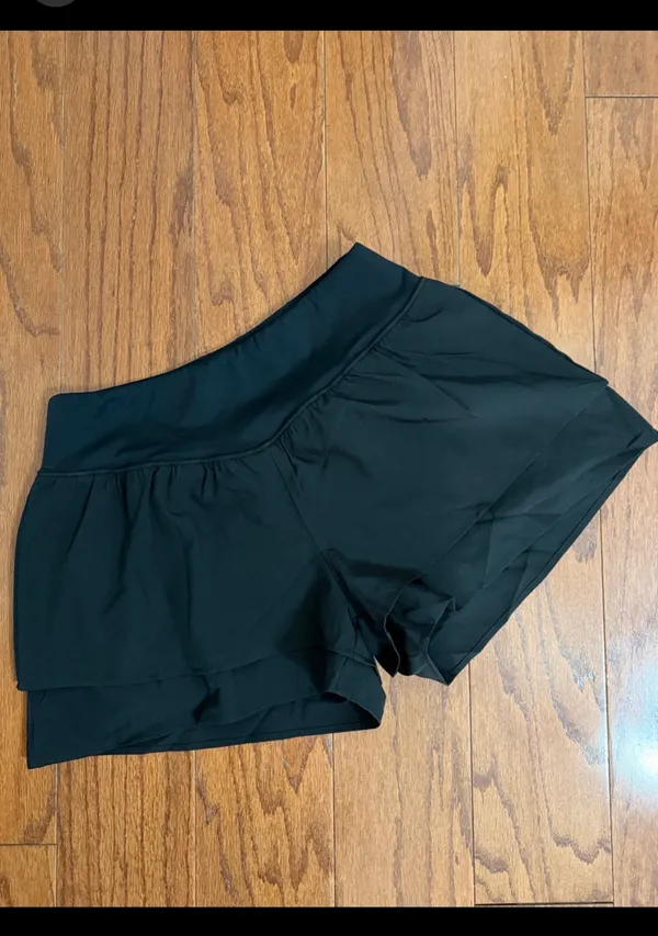 Black Athletic Flowy Activewear Workout Shorts - Size Medium. Gently warn and excellent condition. Under shorts with pockets. Measurements approximately 14” waste, not fully stretched out x 13.5” long. Non-smoking home. priced to sell at as is condition. Don’t like my price, make reasonable offer! And thank you for checking my closet. - Image 2
