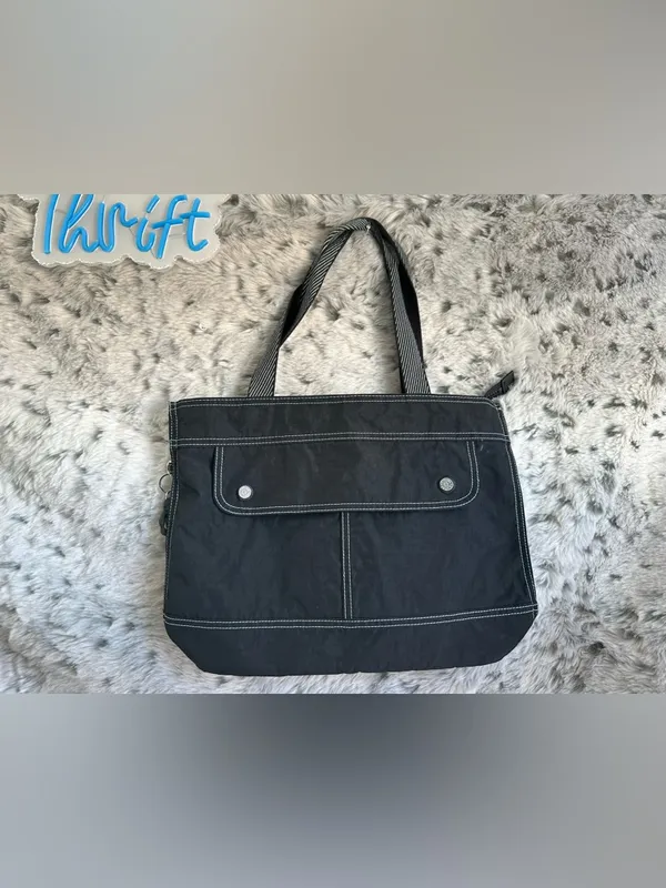 Kipling Ginnie Tote Bag black, prominent front pocket dual straps. - Image 8