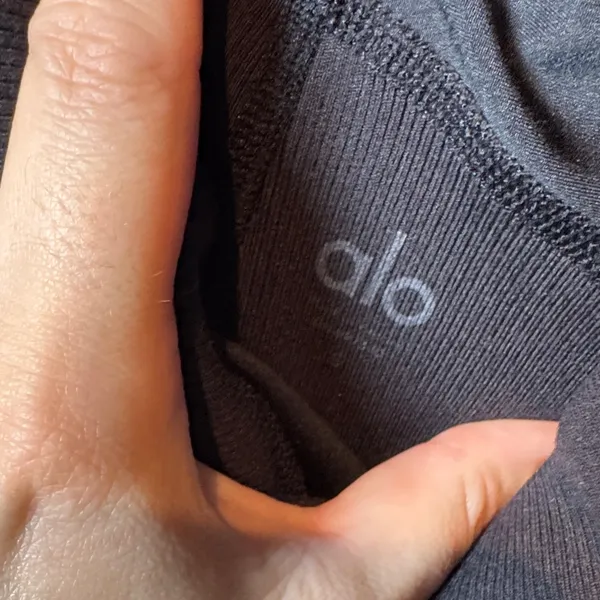 ALO Yoga black Leggings with cross cross design - Image 2
