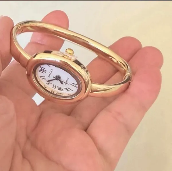 Brand New y2k style gold bangle watch with white face and Roman numerals - Image 2
