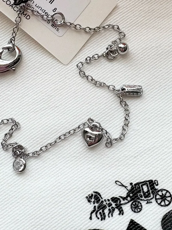 Coach Silver Heart Charm Bracelet with Crystal Accent - Image 2