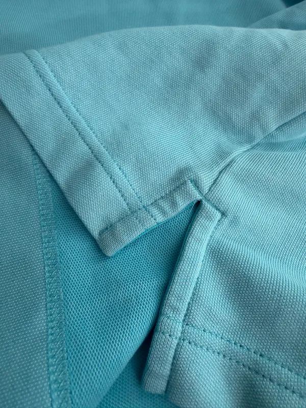 Izod Advantage Performance Men’s Aqua Blue Piqué Polo with Contrast Trim - Image 2