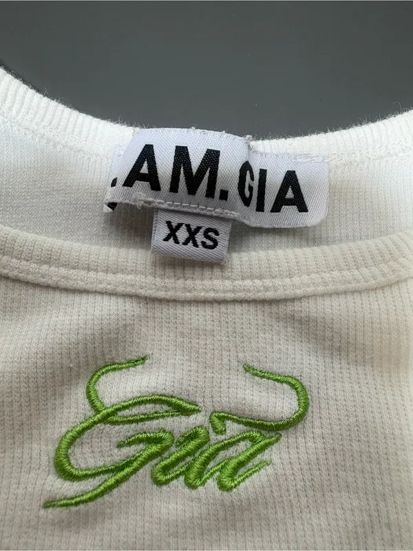 I.AM.GIA White Ribbed Crop Tank with Neon Green Script - Image 4