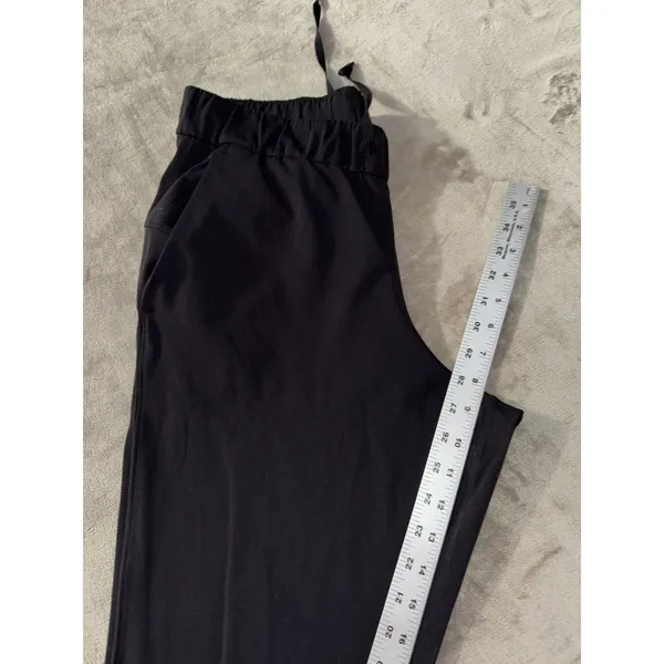 Lululemon Women's On The Fly Pants Black Mid Rise Travel Casual Size 8 - Image 9