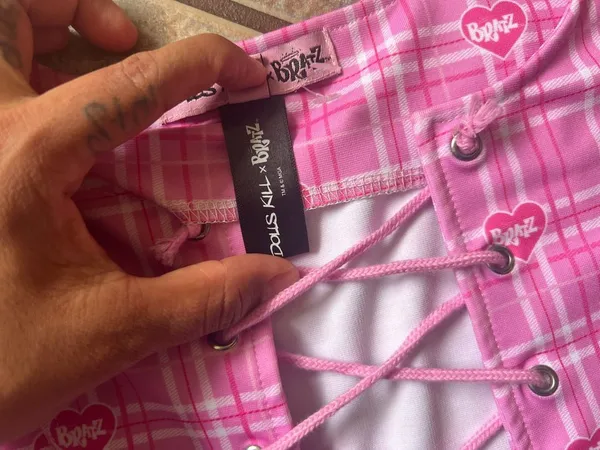 Dolls Kill Pink Plaid Lace-Up Crop Top with Bratz Heart Print - Image 6