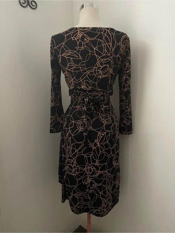 BCBGMaxAzria Black Wrap Midi Dress with Tan Floral Line Print - Image 3