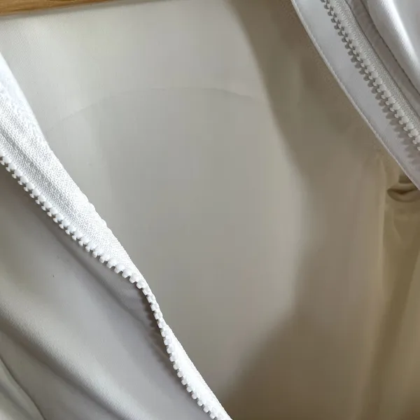 Fabletics white full zip longline jacket women's size small breathable pockets - Image 5