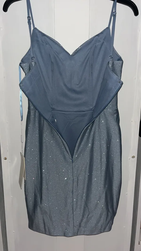 Stacees dusty blue, glittery, mid-length dress, with corset rib design, and knot design on chest, with bra padding built in. - Image 6