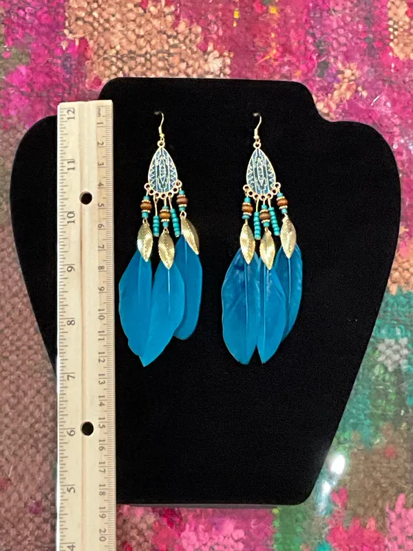 Blue feather earrings with gold accents - Image 4