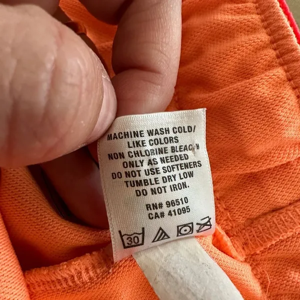 Under Armour women’s loose fit orange & pink athletic shorts large - Image 3