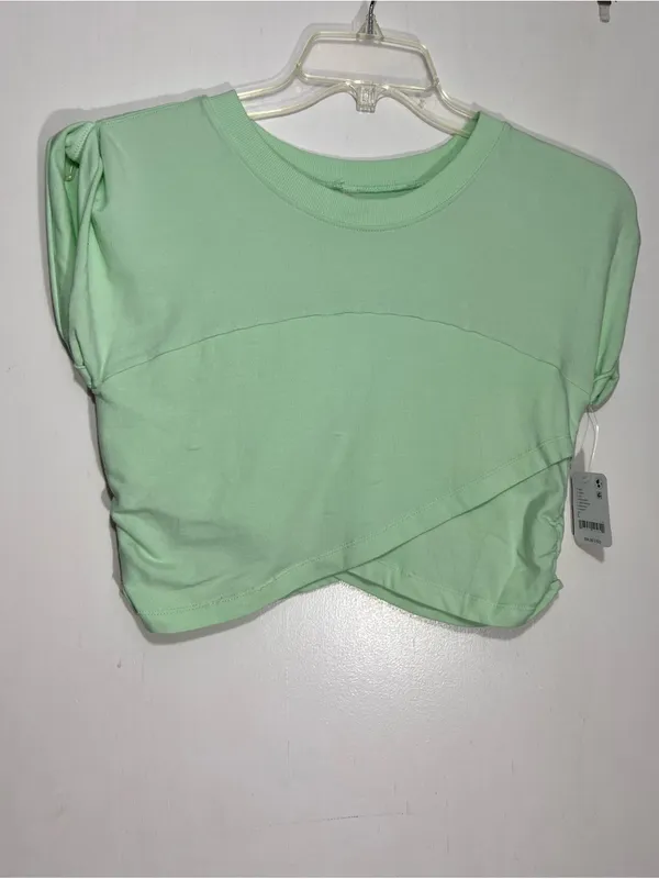 NWT FP Movement Pistachio green hot shot crossover top size L - Image 2