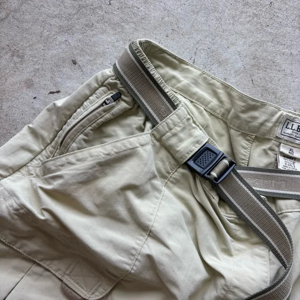L.L. Bean convertible cargo hiking pants feature a built-in webbed belt and zip-off lower legs. - Image 4