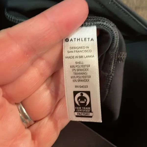 Athleta Ace Black Tennis Skort with silver reflective stripe on waistband - Image 9