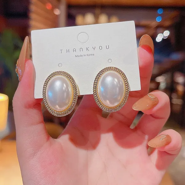 Elegant White Pearl Stud Earrings for Women - Image 2