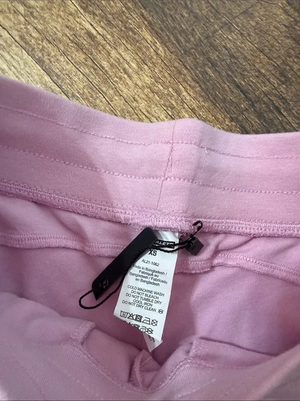 Alphalete Women's Essential Core Athletic Shorts pink - Image 6
